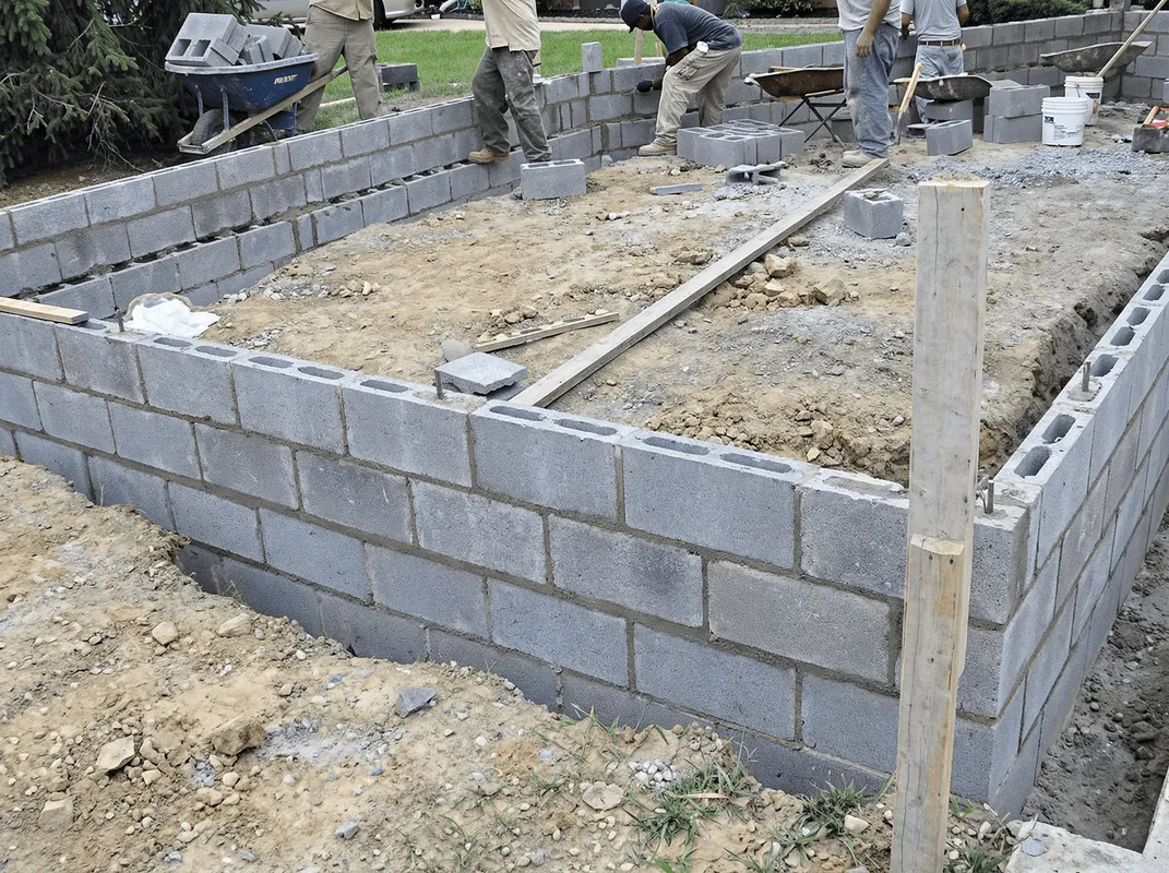 Professionals building a foundation with blocks in Yonkers, NY